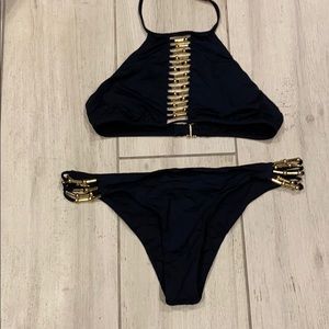 Trina Turk gold and black two piece bathing suit